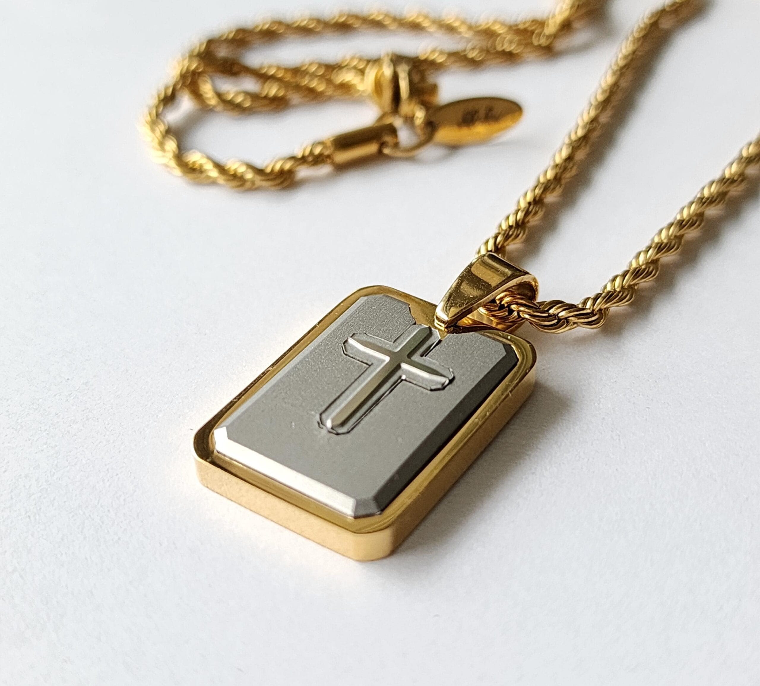 Engraved Cross Dog Tag Necklace, Gold and Silver Stainless Steel, Personalized Gift 9 Close-up of the raised cross