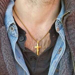 Home 11 Gold cross necklace worn