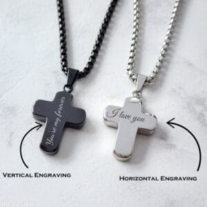 Black and silver cross necklaces showing vertical and horizontal engraving options